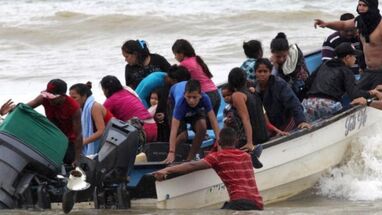 Migrantes en lancha