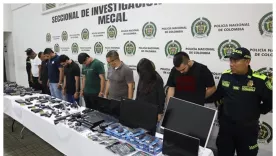 capturados con un arsenal en Cali en una oficina de falsas asesorías jurídicas
