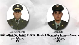 El subintendente Luis Alfonso Flórez y el patrullero Rusbel Alexander Lesmes Moreno.