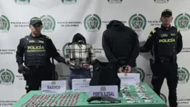 Las dos personas fueron capturadas por los delitos de porte ilegal de armas de fuego y tráfico de estupefacientes