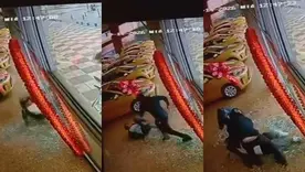 Hombre atraviesa vidrio de concesionario para escapar de intento de fleteo en Bogotá