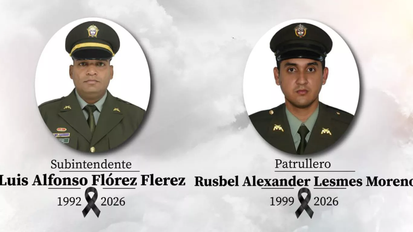 El subintendente Luis Alfonso Flórez y el patrullero Rusbel Alexander Lesmes Moreno.